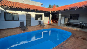Casa c PISCINA E CHURRASQUEIRA em bairro familiar em Foz do Iguacu